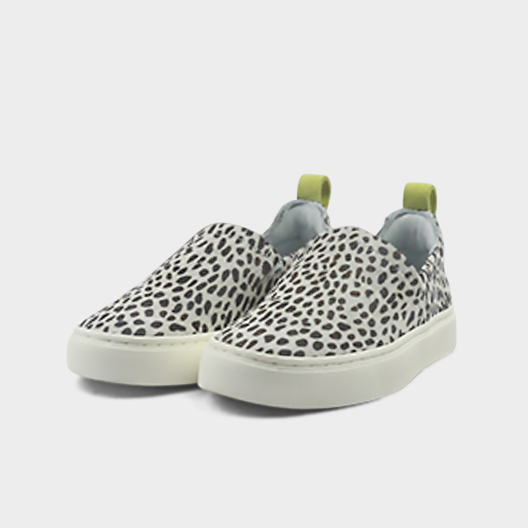 A cheetah slip-on women's shoe with a suede and manmade material upper and a rubber sole quarter view