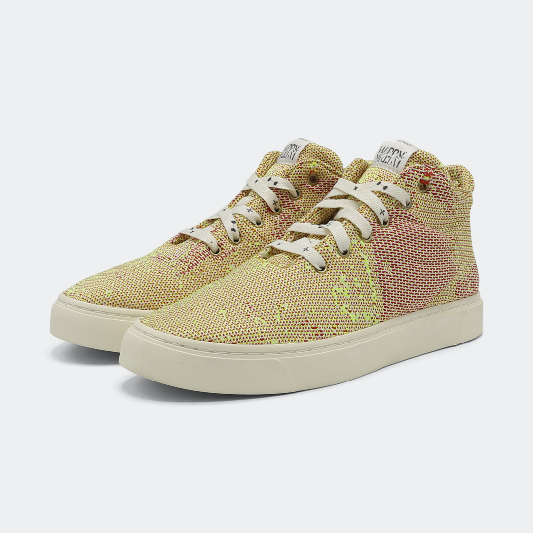 Mid-top sneakers in yellow and pink checkered pattern design quarter view