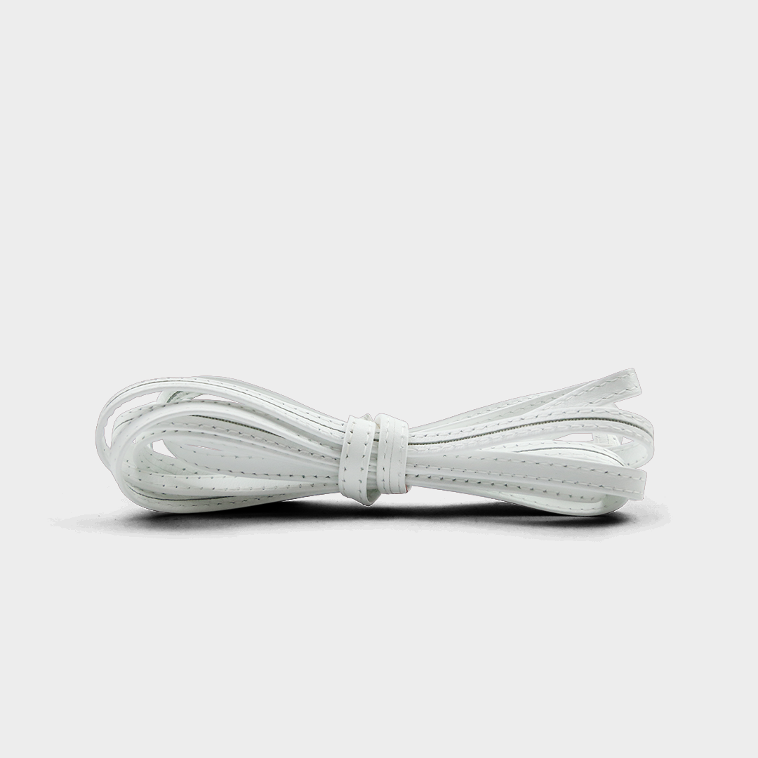 A white leather laces tied in a knot.
